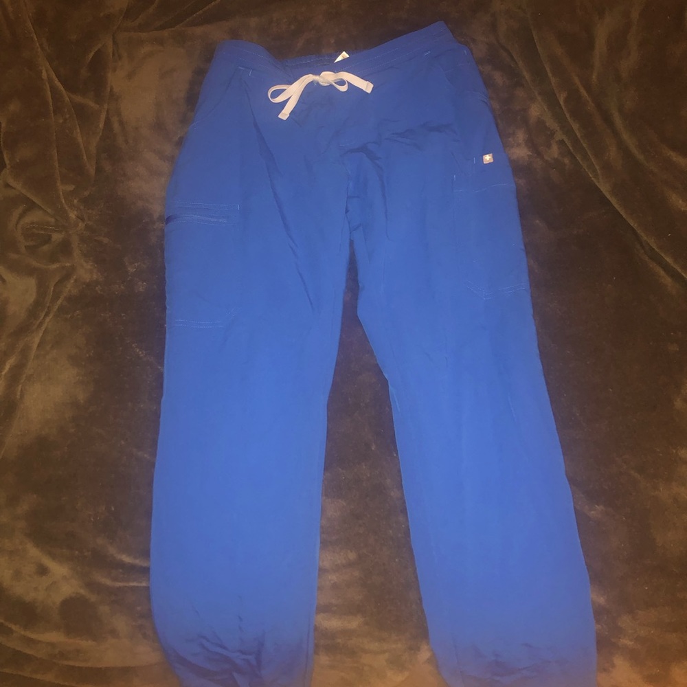 Blue FIGS, lightly worn. Size small, female. Straight leg fit.